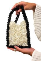 This is a white bad with beats on floral pattren